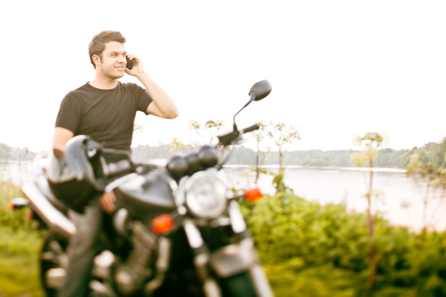 photodune-8273356-motorcyclist-on-the-side-of-the-road-m